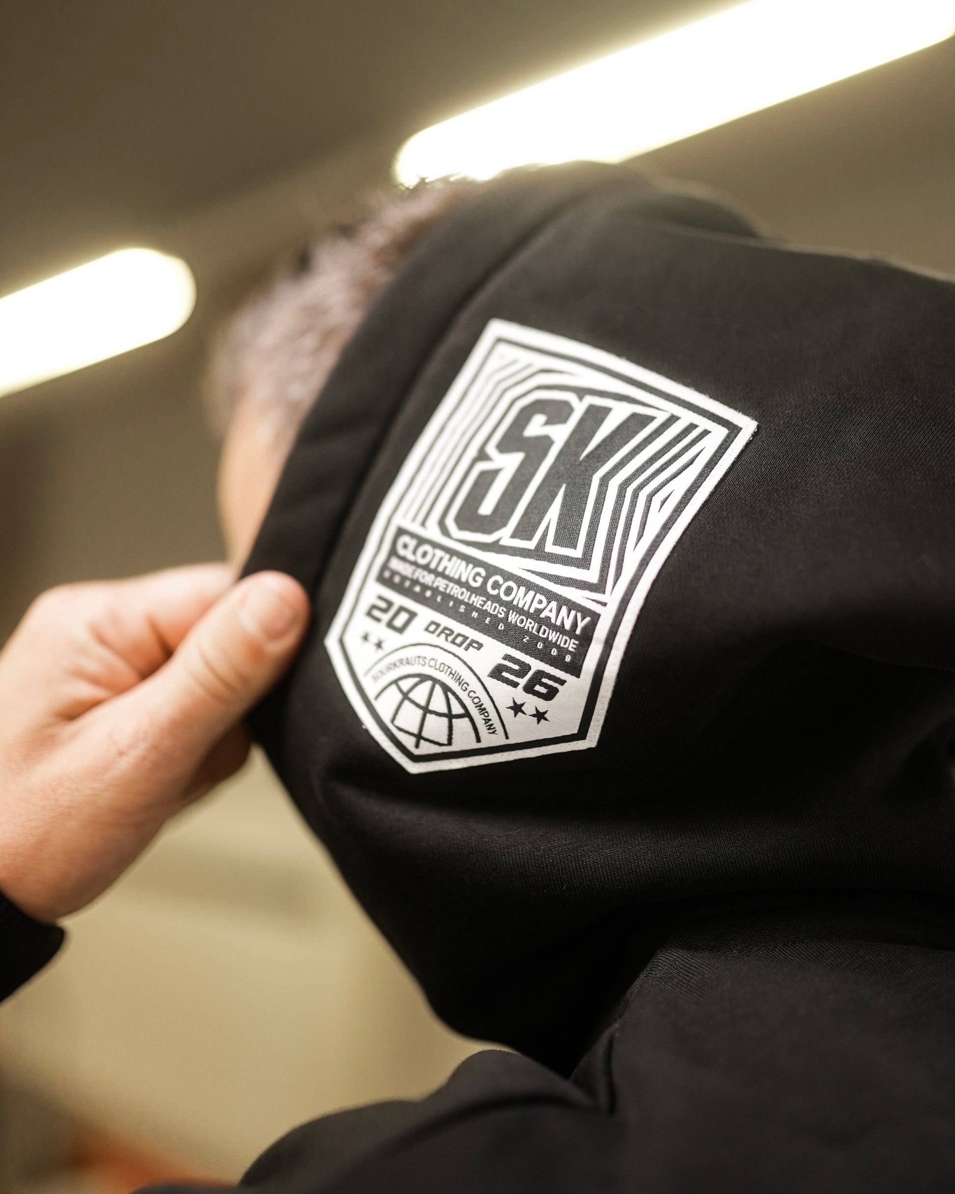 Unisex Hoodie | Sourcrowd | Schwarz
